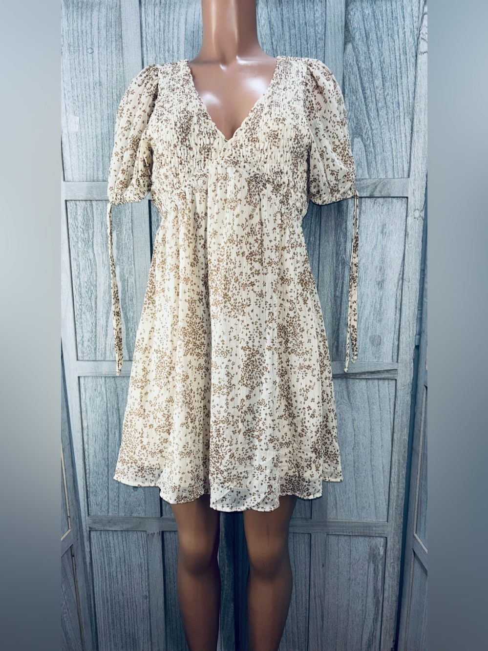 Sienna Sky Gold Floral Babydoll Mini Dress,